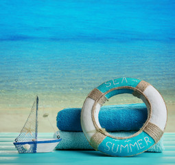 Fototapeta premium Summer accessories on sea background