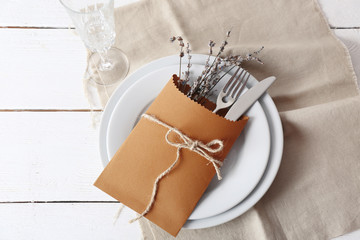Obraz premium Table setting with lavender flowers, close-up