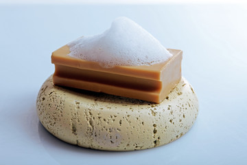 Soap with foam isolated on white