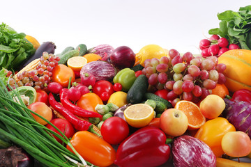 Fototapeta na wymiar Fresh fruits and vegetables isolated on white