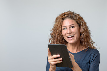 Fototapeta premium Woman Holding a tablet
