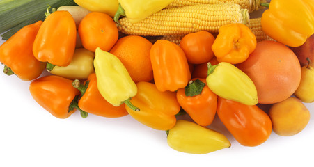 Close-up composition of various raw organic vegetables isolated on white