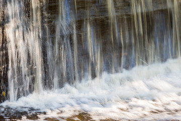 Waterfall over a dam wall
