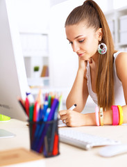 Fashion designers working in studio