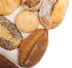 Composition of mixed breads and grains on white background