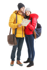 A pair of happy tourists sightseeing in winter, isolated on white