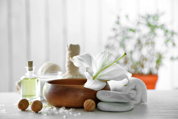 Fototapeta na wymiar Beautiful composition of spa treatment on wooden table