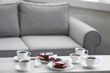Table at home with food and drinks for friends