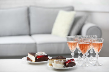 Table at home with food and drinks for friends