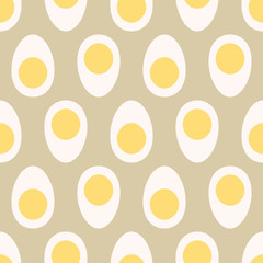 Cut boiled eggs with yolk seamless pattern