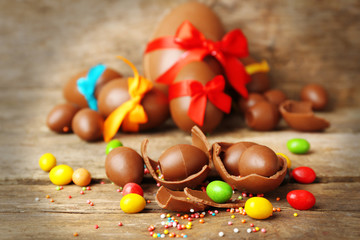 Chocolate Easter eggs on wooden background