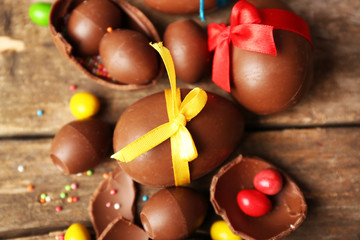 Chocolate Easter eggs on wooden background