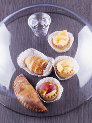 Pastries under glass