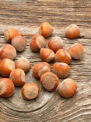 Hazelnuts on wooden background