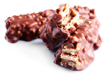 broken crispy candy bars, isolated on white