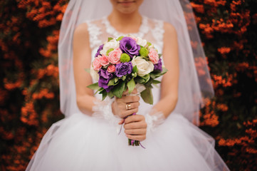 Bride with a wedding bouquet. 