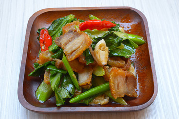 stir fried kale with crispy pork