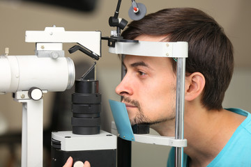 Fototapeta na wymiar Adult male visit an optician