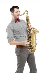Obraz na płótnie Canvas man in yellow t-shirt saxophonist playing. saxophone player in s