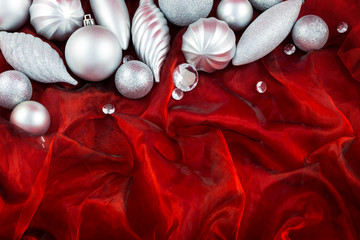 Christmas decorations on a red silk cloth