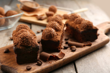 Pieces of chocolate cake on the table, close-up
