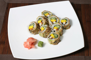 good portion of sushi with vegetable filling