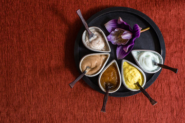 Obraz na płótnie Canvas Thai Herbal Massage Ball with Variety of Body Scrub