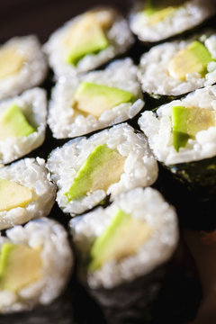 Avocado maki sushi close-up,very shallow depth of the field