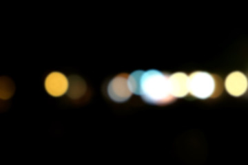 Abstract background with bokeh defocused lights at night