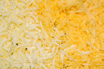 Two types of grated cheese for toppings