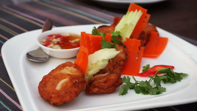 Video of Thai traditional cuisine with fusion decoration. Curry fish cake dish