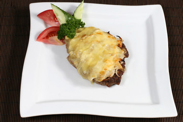 beef baked with cheese and vegetables