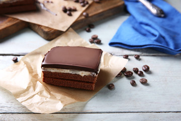 Delicious chocolate brownies on wooden background