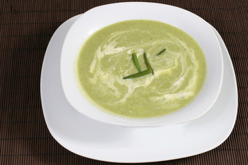 pea soup with greens and sour cream