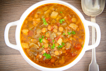 Lentil soup with eggplant, tomatoes and onions