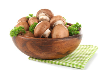 Mushrooms in bowl, isolated on white