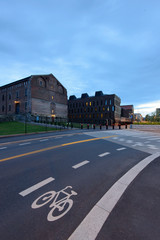 Fototapeta premium Bicycle lane signage on street in Norwegian city. Evening