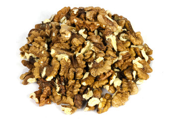Bunch of shelled walnuts on white