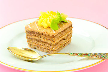 Sweets: Cream Cakes on Plate.
