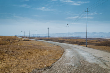 Paved road in Iraqi desert 