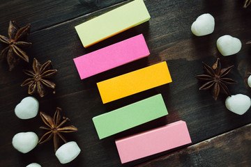 Colorful blank stickers on the wooden table
