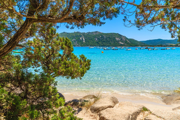 View of crystal clear turquoise sea water of Santa Giulia beach, Corsica island, France