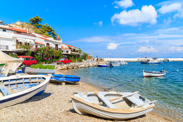 Fototapeta na wymiar Fishing boats on beach in Kokkari village, Samos island, Greece