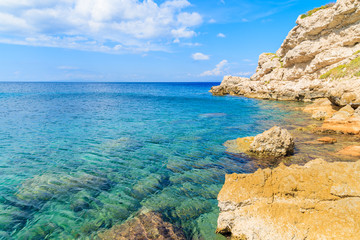 Crystal clear sea water of Aegean Sea at Kokkari beach, Samos island, Greece