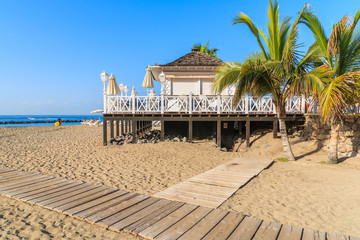 Restaurant building on El Duque beach in Costa Adeje town, Tenerife, Canary Islands, Spain