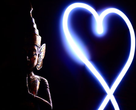 Buddha and light painted heart