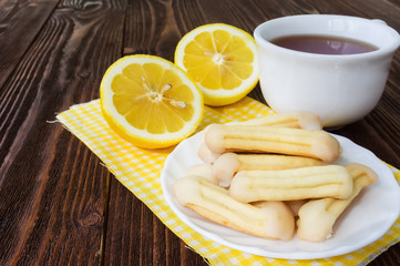 Homemade lemon churros (finger biscuits) with cup of tea