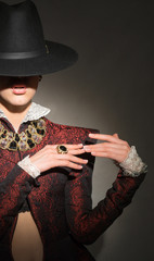 Girl in a red jacket with jewels