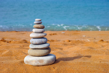 Fototapeta na wymiar Stone balance on beach