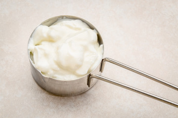 measuring cup of Greek yogurt